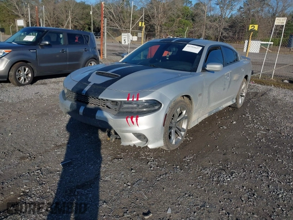 2020 Dodge Charger R/T with VIN 2C3CDXCT6LH106652, listed as a IAAI auction lot 41595647 with 97,758 mi miles and . Bid and sale history available at carsss.com. Image 2.
