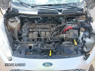 2014 Ford Fiesta SE with VIN 3FADP4EJ4EM151911, listed as a IAAI auction lot 42096321 with 129,938 mi miles and . Bid and sale history available at DreamBid. Image 10.