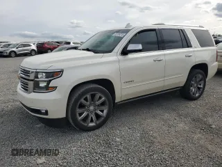 2015 Chevrolet Tahoe LTZ z VIN 1GNSCCKC3FR615470, wystawiony jako Copart lot #52783215 z przebiegiem 132 788 mil mil oraz Szkoda całkowita • Salvage title. Historia ofert i sprzedaży dostępna na DreamBid. Obrazek 1.