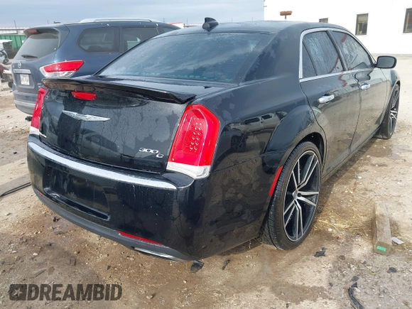 2015 Chrysler 300 C with VIN 2C3CCAEG8FH908477, listed as a IAAI auction lot 41702256 with 140,017 mi miles and . Bid and sale history available at carsss.com. Image 4.