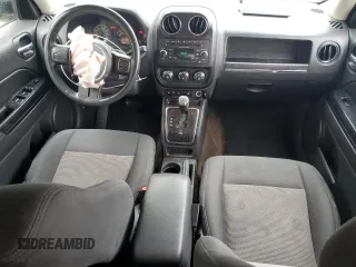2014 Jeep Patriot Latitude with VIN 1C4NJPFA1ED651021, listed as a Copart auction lot 56947445 with 137,239 mi miles and Salvage title. Bid and sale history available at DreamBid. Image 8.
