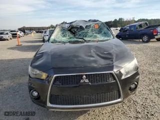 2010 Mitsubishi Outlander SE with VIN JA4AS3AW1AZ014063, listed as a Copart auction lot 79934964 with 140,404 mi miles and Salvage Title. Bid and sale history available at carsss.com. Image 5.
