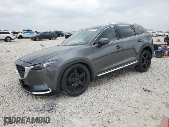 2019 Mazda CX-9 Grand Touring z VIN JM3TCADY9K0300284, wystawiony jako Copart lot #51801365 z przebiegiem 53 550 mil mil oraz Szkoda całkowita • Salvage title. Historia ofert i sprzedaży dostępna na DreamBid. Obrazek 1.