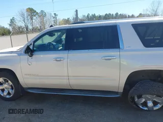 2015 Chevrolet Suburban LTZ with VIN 1GNSCKKC3FR113388, listed as a IAAI auction lot 41867964 with 238,530 mi miles and . Bid and sale history available at DreamBid. Image 15.
