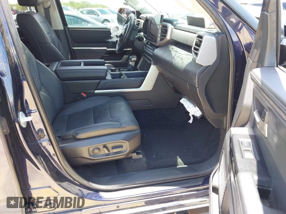 2023 Toyota Tundra Limited with VIN 5TFJA5DB9PX117183, listed as a IAAI auction lot 42352970 with 15,082 mi miles and . Bid and sale history available at DreamBid. Image 5.