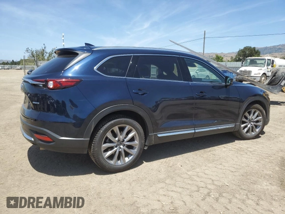 2021 Mazda CX-9 Grand Touring with VIN JM3TCBDY6M0520443, listed as a Copart auction lot 57403735 with 31,414 mi miles and Salvage title. Bid and sale history available at DreamBid. Image 3.