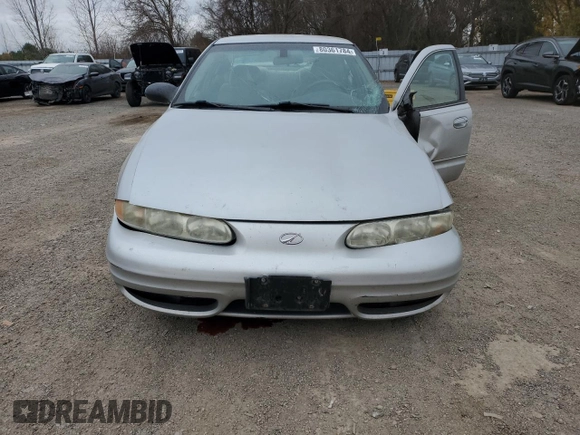 2004 Oldsmobile Alero GL1 z VIN 1G3NL52E54C192426, wystawiony jako Copart lot #80361784 z przebiegiem 251 493 mil mil oraz Szkoda całkowita • Salvage title. Historia ofert i sprzedaży dostępna na DreamBid. Obrazek 5.