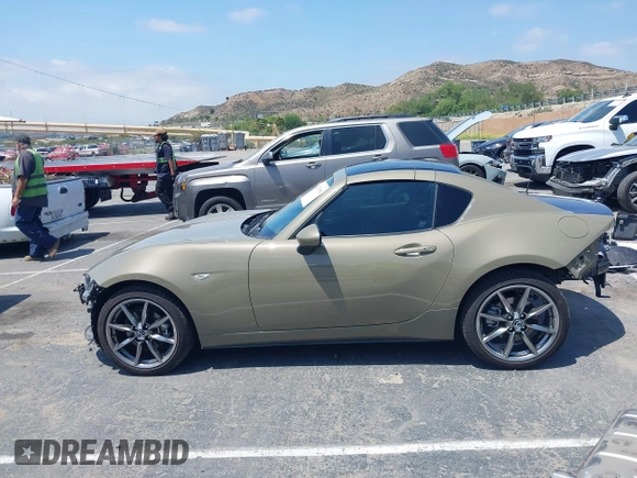 2023 Mazda MX-5 Miata Grand Touring z VIN JM1NDAM73P0561844, wystawiony jako IAAI lot #42195198 z przebiegiem 6 020 mil mil oraz . Historia ofert i sprzedaży dostępna na DreamBid. Obrazek 15.