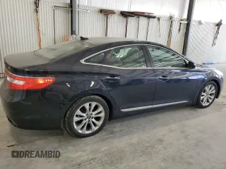 2013 Hyundai Azera z VIN KMHFG4JG1DA217528, wystawiony jako Copart lot #56123655 z przebiegiem 148 606 mil mil oraz Szkoda całkowita • Salvage title. Historia ofert i sprzedaży dostępna na DreamBid. Obrazek 3.