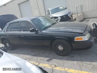 2004 Ford Police Interceptor Base w/3.27 Axle with VIN 2FAFP71W34X136279, listed as a IAAI auction lot 41945086 with 151,350 mi miles. Bid and sale history available at carsss.com. Image 13.