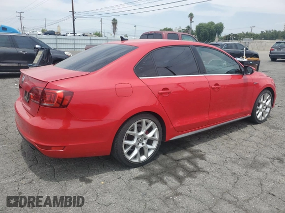 2014 Volkswagen Jetta GLI with VIN 3VW4T7AJ0EM318615, listed as a Copart auction lot 58542385 with 211,879 mi miles and Salvage title. Bid and sale history available at DreamBid. Image 3.