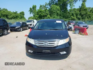 2011 Honda Odyssey Touring with VIN 5FNRL5H97BB073708, listed as a IAAI auction lot 42409164 with 141,986 mi miles and . Bid and sale history available at DreamBid. Image 12.