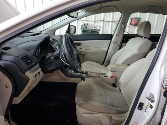 2012 Subaru Impreza Premium with VIN JF1GPAC6XCH246534, listed as a Copart auction lot 61001935 with 141,728 mi miles and Salvage title. Bid and sale history available at DreamBid. Image 7.