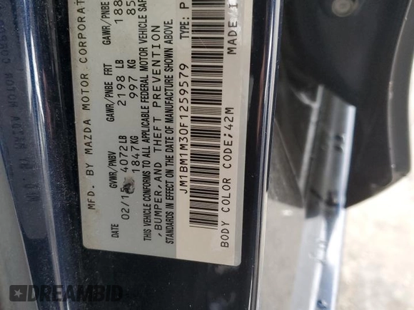 2015 Mazda 3 S Grand Touring with VIN JM1BM1M30F1259579, listed as a Copart auction lot 58244985 with 113,823 mi miles and Salvage title. Bid and sale history available at DreamBid. Image 12.