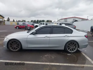 2014 BMW 3 Series 328i with VIN WBA3C1C58EK105766, listed as a IAAI auction lot 41692037 with 156,038 mi miles. Bid and sale history available at carsss.com. Image 14.