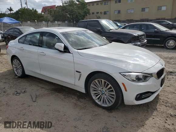 2015 BMW 4 Series 428i xDrive with VIN WBA4C9C53FG135314, listed as a Copart auction lot 82090253 with 93,188 mi miles and . Bid and sale history available at DreamBid. Image 4.
