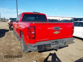 2015 Chevrolet Silverado 1500 LT with VIN 3GCPCREH9FG197666, listed as a IAAI auction lot 41348959 with 130,251 mi miles and . Bid and sale history available at DreamBid. Image 3.