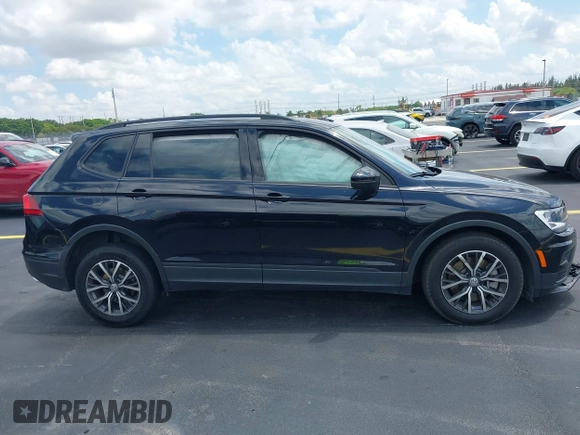 2021 Volkswagen Tiguan S z VIN 3VV1B7AX7MM116609, wystawiony jako IAAI lot #42206016 z przebiegiem 47 049 mil mil oraz . Historia ofert i sprzedaży dostępna na DreamBid. Obrazek 13.