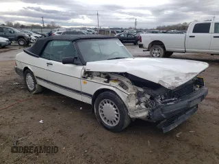 1988 Saab 900 z VIN YS3AT75L0J7015445, wystawiony jako Copart lot #77775074 z przebiegiem 225 073 mil mil oraz Szkoda całkowita • Salvage title. Historia ofert i sprzedaży dostępna na DreamBid. Obrazek 4.
