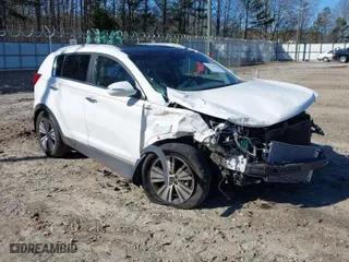 2016 Kia Sportage EX with VIN KNDPCCAC0G7869473, listed as a IAAI auction lot 41226399 with 126,008 mi miles. Bid and sale history available at carsss.com. Image 1.