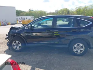 2014 Honda CR-V LX z VIN 2HKRM4H30EH719860, wystawiony jako IAAI lot #42256470 z przebiegiem 139 035 mil mil oraz . Historia ofert i sprzedaży dostępna na DreamBid. Obrazek 15.