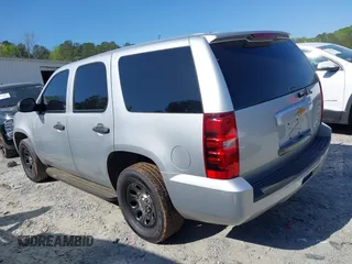 2013 Chevrolet Tahoe Commercial with VIN 1GNLC2E03DR124278, listed as a IAAI auction lot 39201429 with 182,584 mi miles and . Bid and sale history available at DreamBid. Image 3.