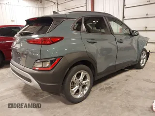 2022 Hyundai Kona SEL with VIN KM8K6CAB3NU890448, listed as a IAAI auction lot 41879210 with 74,438 mi miles and . Bid and sale history available at DreamBid. Image 4.
