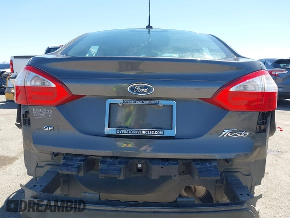 2015 Ford Fiesta SE with VIN 3FADP4BJ1FM217045, listed as a IAAI auction lot 42120444 with 119,207 mi miles and . Bid and sale history available at DreamBid. Image 17.