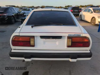 1983 Datsun 280ZX z VIN JN1HZ04S2DX564639, wystawiony jako Copart lot #75222314 z przebiegiem 75 925 mil mil oraz Szkody całkowita. Historia ofert i sprzedaży dostępna na DreamBid. Obrazek 6.
