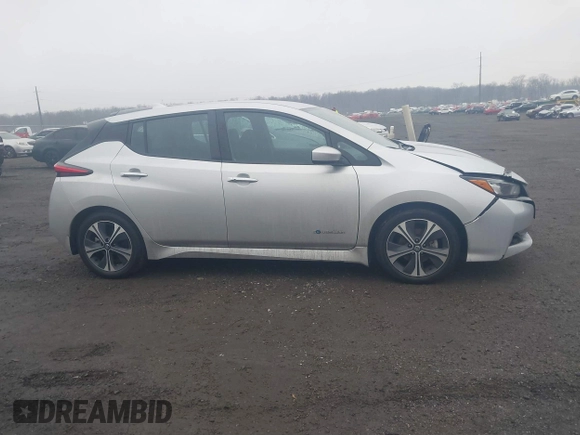 2019 Nissan LEAF SV z VIN 1N4AZ1CP2KC321523, wystawiony jako IAAI lot #41457178 z przebiegiem 28 146 mil mil oraz . Historia ofert i sprzedaży dostępna na DreamBid. Obrazek 13.