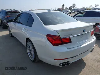 2015 BMW 7 Series 750Li with VIN WBAYE8C52FD785162, listed as a IAAI auction lot 42121389 with 88,783 mi miles and . Bid and sale history available at DreamBid. Image 3.