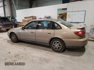 2002 Saturn LS z VIN 1G8JU54F62Y528998, wystawiony jako Copart lot #48390715 z przebiegiem 249 471 mil mil oraz Szkody całkowita. Historia ofert i sprzedaży dostępna na DreamBid. Obrazek 2.