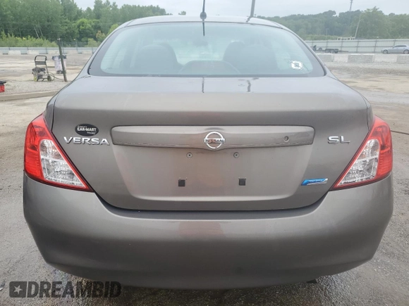 2012 Nissan Versa SV z VIN 3N1CN7AP1CL927523, wystawiony jako Copart lot #58196055 z przebiegiem 156 057 mil mil oraz Nie do naprawy • Non repairable. Historia ofert i sprzedaży dostępna na DreamBid. Obrazek 6.