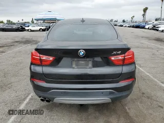 2018 BMW X4 xDrive28i z VIN 5UXXW3C57J0T82047, wystawiony jako Copart lot #55988675 z przebiegiem 103 692 mil mil oraz Szkody całkowita. Historia ofert i sprzedaży dostępna na DreamBid. Obrazek 6.