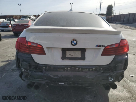 2014 BMW M5 with VIN WBSFV9C56ED097642, listed as a Copart auction lot 77905514 with 77,022 mi miles and Salvage Title. Bid and sale history available at carsss.com. Image 6.