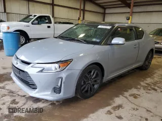 2014 Scion tC z VIN JTKJF5C7XE3071780, wystawiony jako Copart lot #47220975 z przebiegiem 102 630 mil mil oraz Szkody całkowita. Historia ofert i sprzedaży dostępna na DreamBid. Obrazek 1.