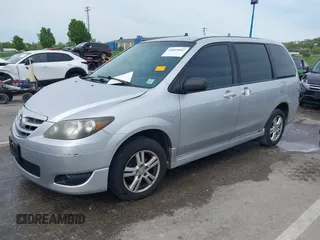 2004 Mazda MPV LX with VIN JM3LW28AX40531451, listed as a IAAI auction lot 42099092 with 249,548 mi miles and . Bid and sale history available at carsss.com. Image 2.