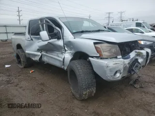 2004 Nissan Titan LE with VIN 1N6AA07A94N507274, listed as a Copart auction lot 47797205 with 144,021 mi miles and Salvage Title. Bid and sale history available at DreamBid. Image 4.