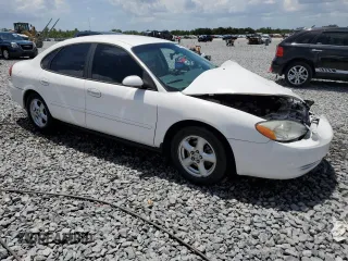 2003 Ford Taurus SES Standard z VIN 1FAFP55U93A162213, wystawiony jako Copart lot #54657645 z przebiegiem 43 756 mil mil oraz Szkoda całkowita • Salvage title. Historia ofert i sprzedaży dostępna na DreamBid. Obrazek 4.