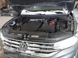 2023 Volkswagen Tiguan SE with VIN 3VVMB7AX5PM013447, listed as a IAAI auction lot 41615200 with 66,259 mi miles and . Bid and sale history available at DreamBid. Image 10.
