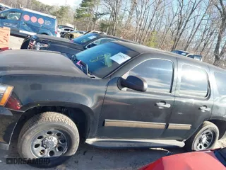 2012 Chevrolet Tahoe Commercial with VIN 1GNLC2E04CR191339, listed as a IAAI auction lot 41642943 with 152,941 mi miles. Bid and sale history available at carsss.com. Image 14.