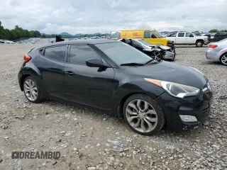 2012 Hyundai Veloster w/Black Int with VIN KMHTC6AD0CU059003, listed as a Copart auction lot 58480625 with 133,137 mi miles and Salvage title. Bid and sale history available at DreamBid. Image 4.