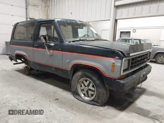 1984 Ford Bronco z VIN 1FMCU14S4EUC26217, wystawiony jako IAAI lot #42598219 z przebiegiem 43 405 mil mil oraz . Historia ofert i sprzedaży dostępna na DreamBid. Obrazek 1.