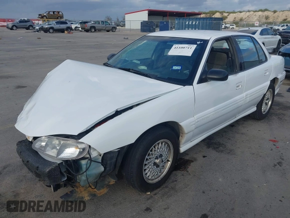 1997 Pontiac Grand Am SE with VIN 1G2NE52T3VC809661, listed as a IAAI auction lot 41100711 with 168,686 mi miles and . Bid and sale history available at DreamBid. Image 2.