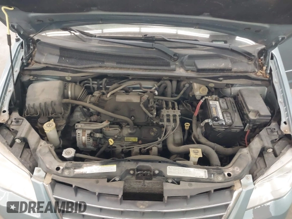 2010 Chrysler Town & Country LX with VIN 2A4RR4DE1AR285996, listed as a IAAI auction lot 42236641 with 165,772 mi miles and . Bid and sale history available at DreamBid. Image 10.