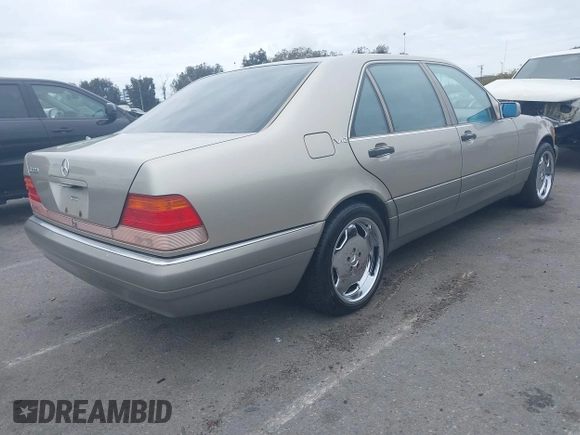 1996 Mercedes-Benz S with VIN WDBGA57E8TA318326, listed as a IAAI auction lot 42072979 with 97,504 mi miles and . Bid and sale history available at DreamBid. Image 4.