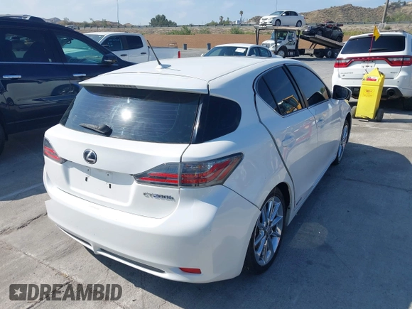 2011 Lexus CT 200h with VIN JTHKD5BH2B2015893, listed as a IAAI auction lot 42095735 with 124,619 mi miles and . Bid and sale history available at DreamBid. Image 4.