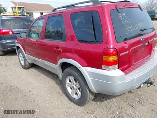 2007 Ford Escape Hybrid with VIN 1FMCU59H17KA98246, listed as a IAAI auction lot 41789024 with 999,999 mi miles. Bid and sale history available at carsss.com. Image 3.
