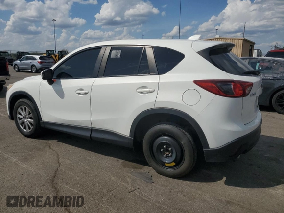 2015 Mazda CX-5 Touring with VIN JM3KE2CY7F0445603, listed as a Copart auction lot 54582225 with 123,319 mi miles and Clean Title. Bid and sale history available at carsss.com. Image 2.