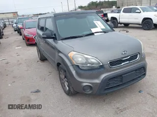 2012 Kia Soul + with VIN KNDJT2A66C7412428, listed as a IAAI auction lot 41636685 with 165,512 mi miles. Bid and sale history available at carsss.com. Image 1.